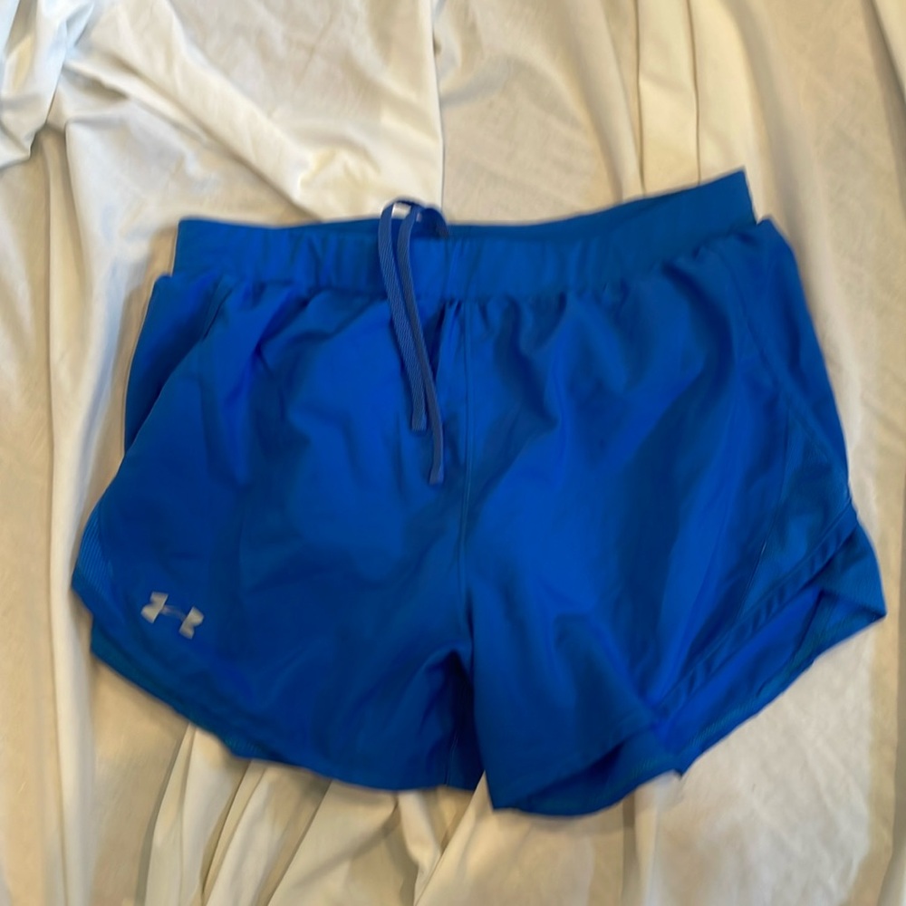 Women’s Under Armour HeatGear Loose Solid Blue Lined Medium
Running Shorts